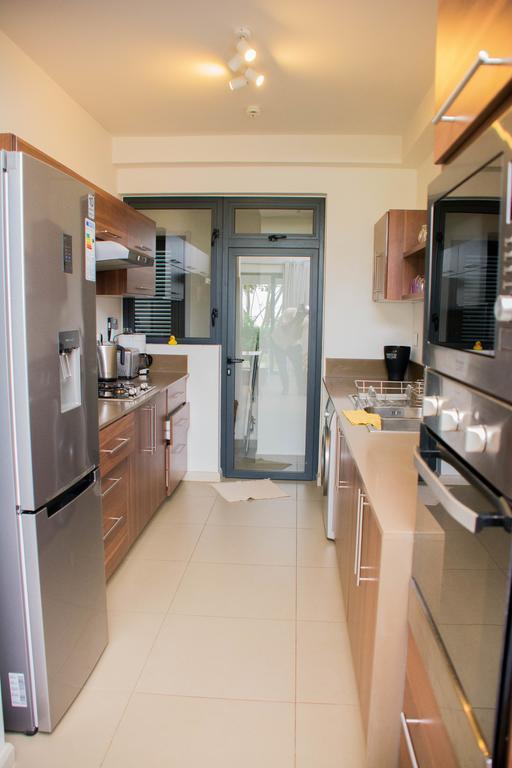 Apartment Azuri Roches Noires Esterno foto