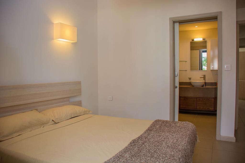 Apartment Azuri Roches Noires Esterno foto