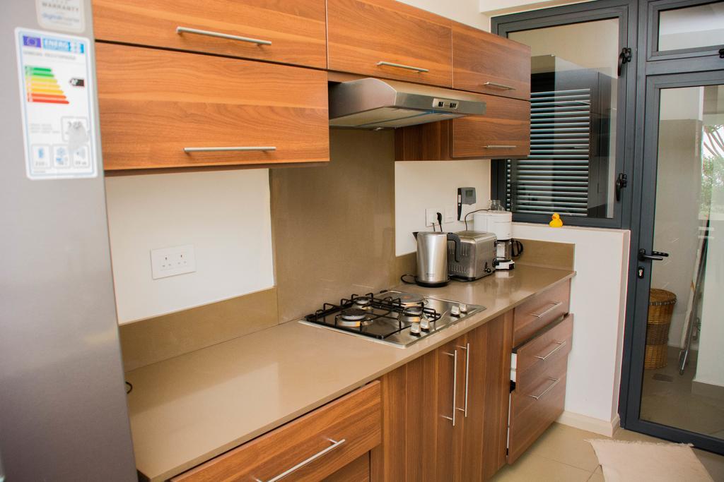 Apartment Azuri Roches Noires Esterno foto